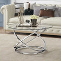 Table basse ronde, plateau verre/pierre, piètement chromé/doré, 1 personne